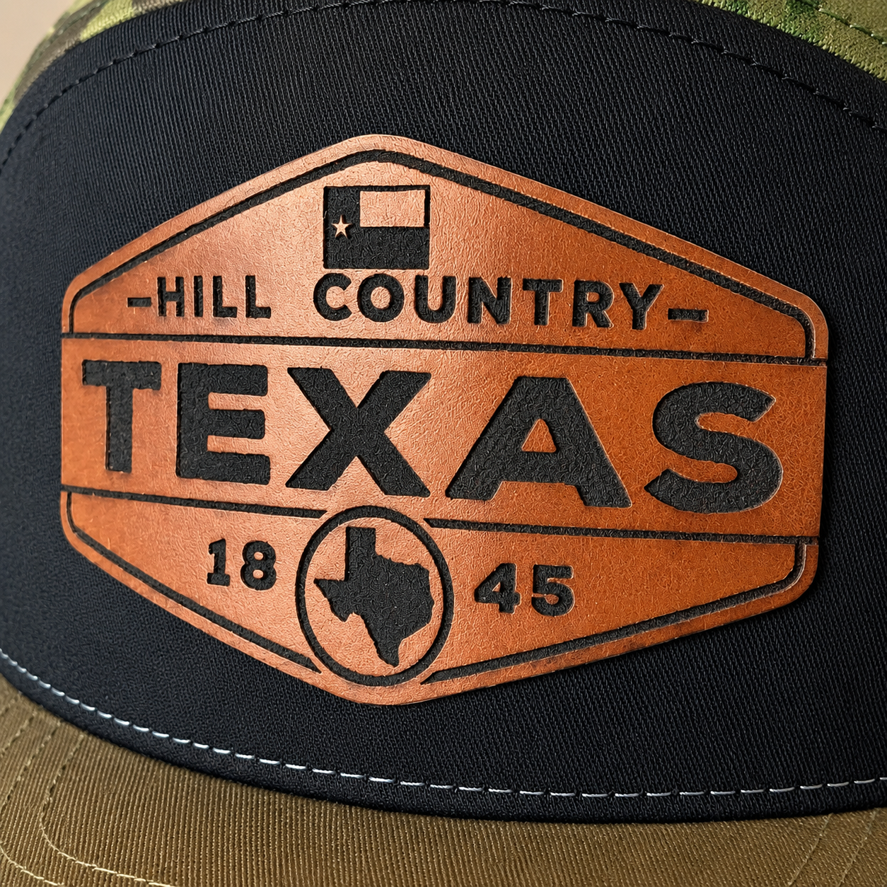 texas hill country brown leatherette patch hat camo richardson 168 7 panel closeup texas hill country brown leatherette patch hat camo richardson 168 7 panel closeup